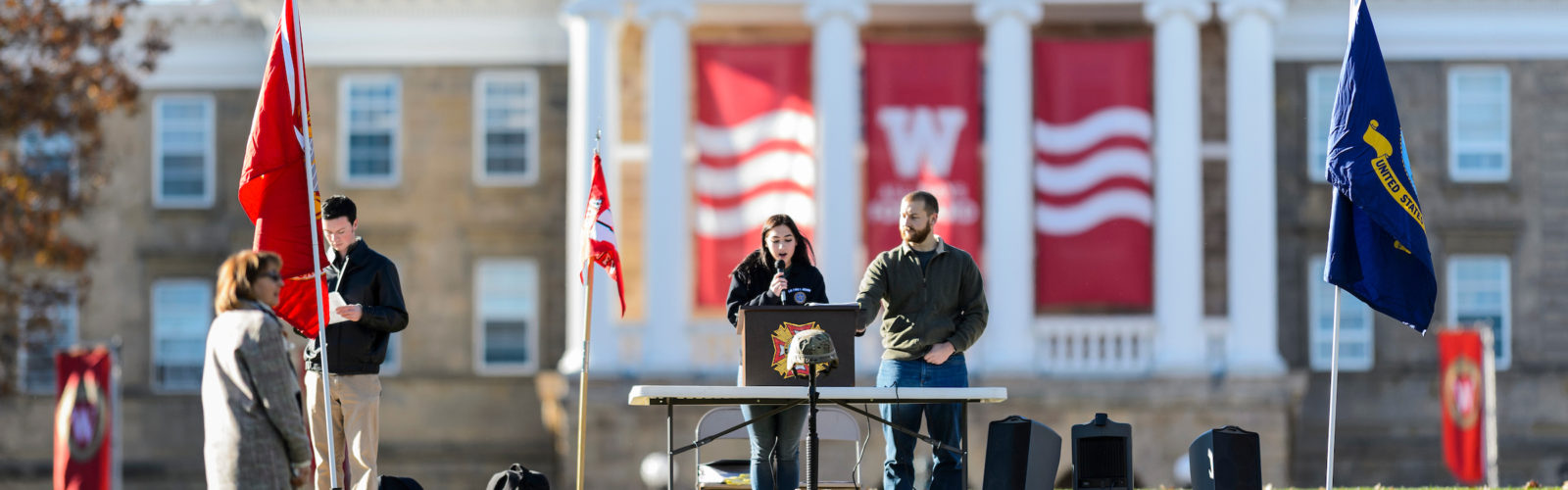photo of students making a Memorial Day presentation on Bascom Hill